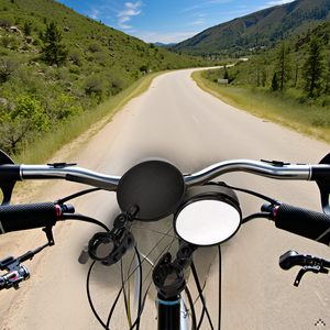 A scenic mountain trail winding through a lush forest, with the product mounted on a bicycle handleb
