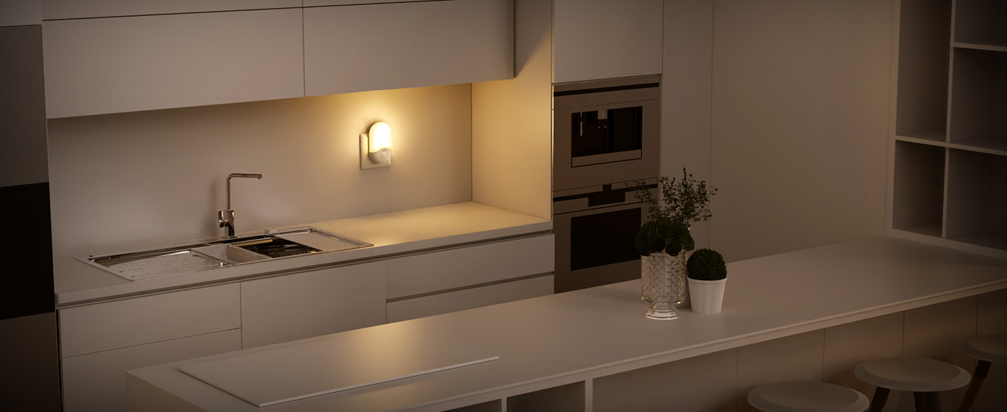 Modern kitchen interior with white cabinets, built-in appliances, and ambient lighting. Minimalist design with clean lines and neutral colors.