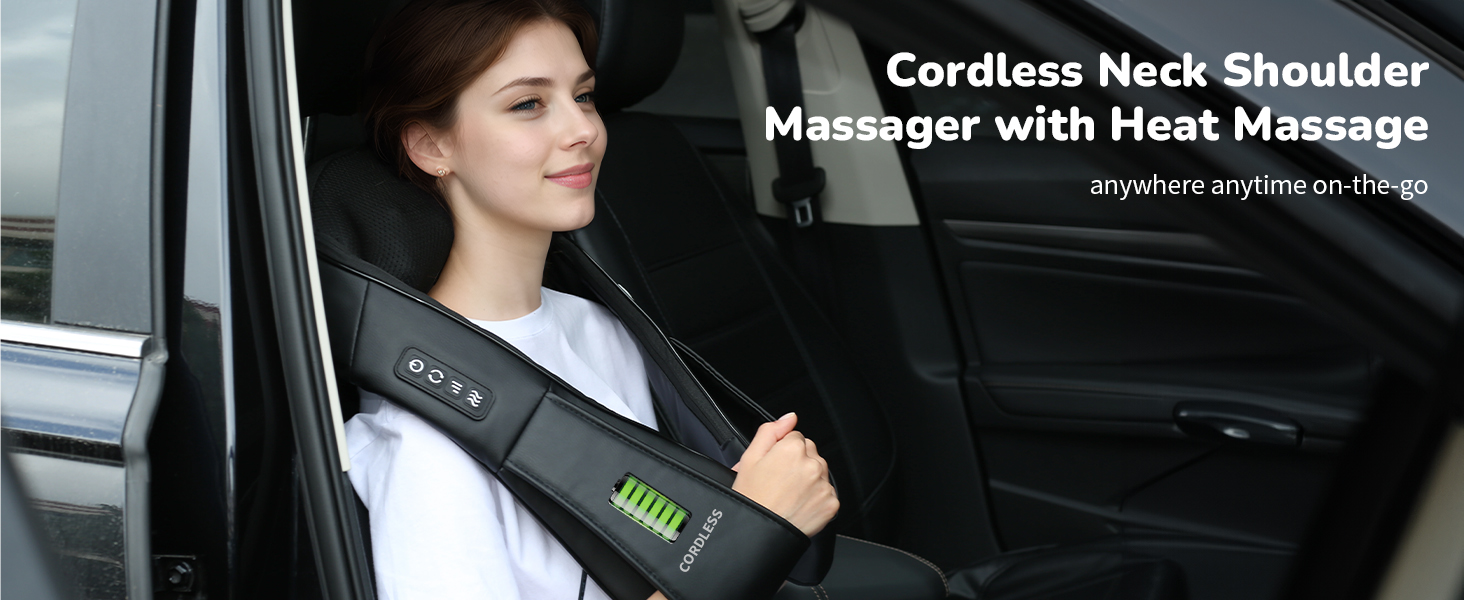 Cordless neck and shoulder massager with heat function. Device shown in use while sitting in a car, featuring a black design with green battery indicator lights.
