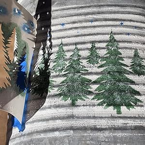 Revealing a stenciled Christmas Tree design