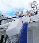 AVA1000 being use to knock snow off a two story building