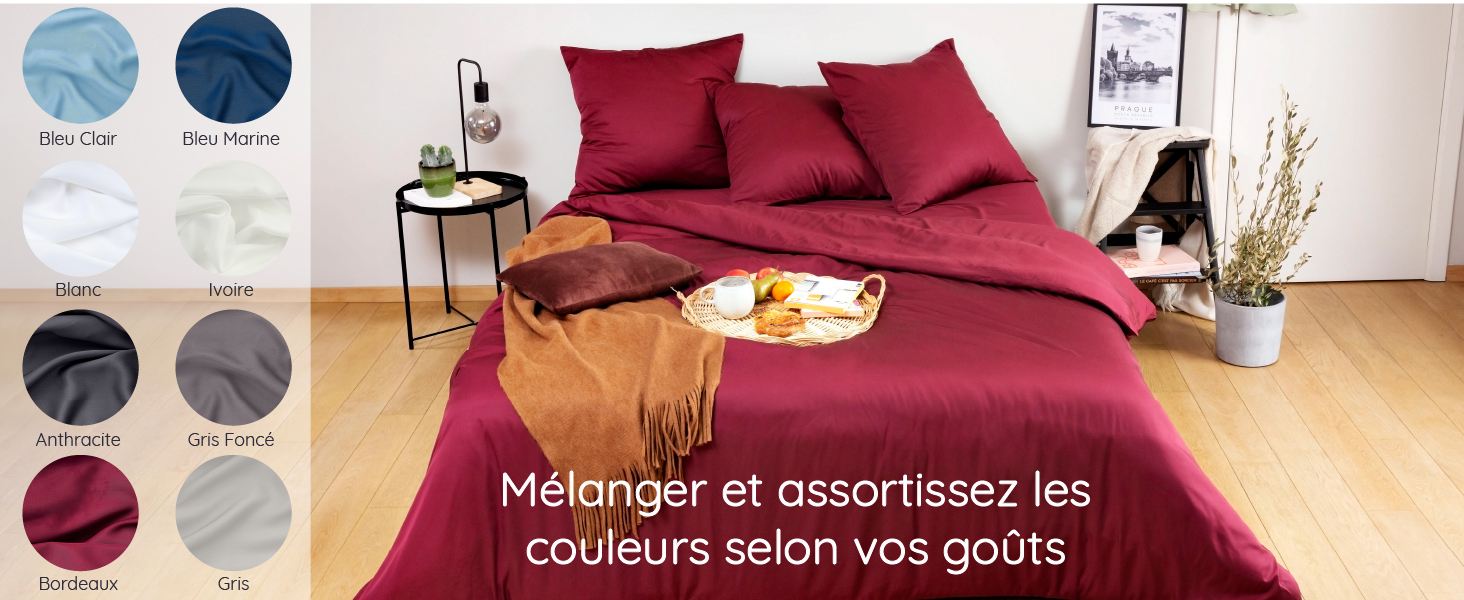 lit avec sur la gauche toutes les couleurs disponibles dans la gamme de draps de lit