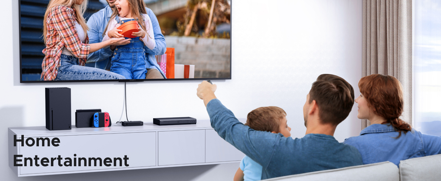 Living room entertainment setup showing mounted TV screen with gaming or streaming content, with text 'Home Entertainment' visible below.