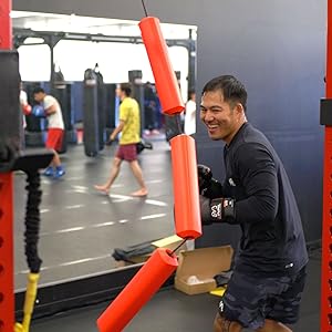 Having fun and smiling at jukestir coordination punching bag
