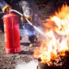 Fire extinguisher putting out fire
