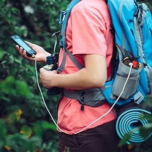 a person with a backpack and a cell phone