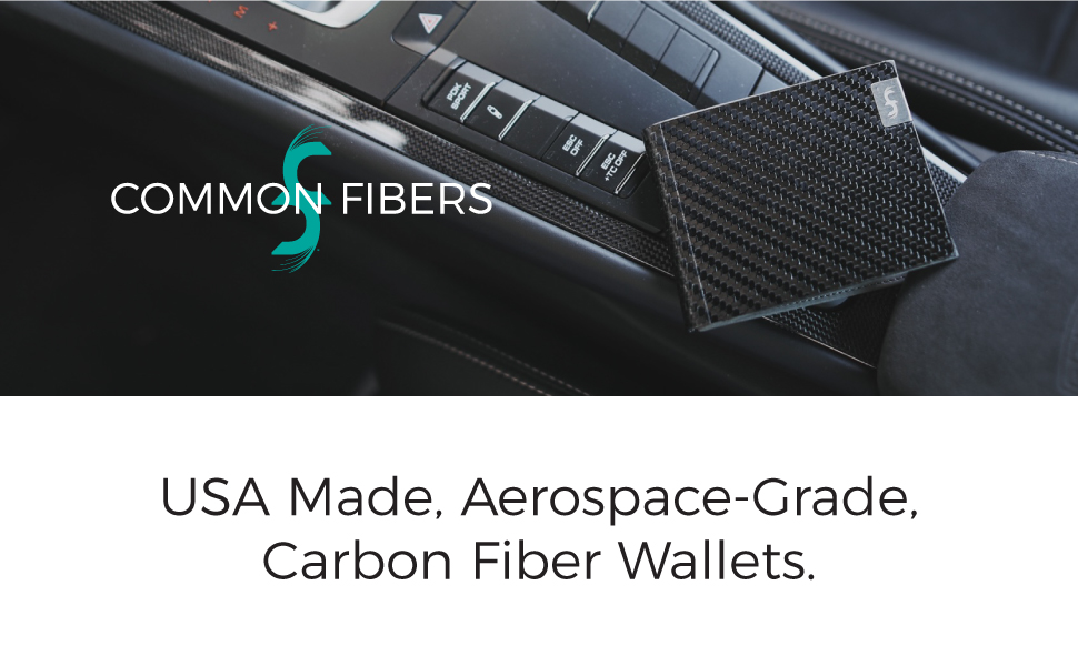 A Common Fibers wallet, with glossy carbon fiber showing, sitting on a Porsche center console