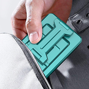 Ultra-portable cell phone holder with desk speaker