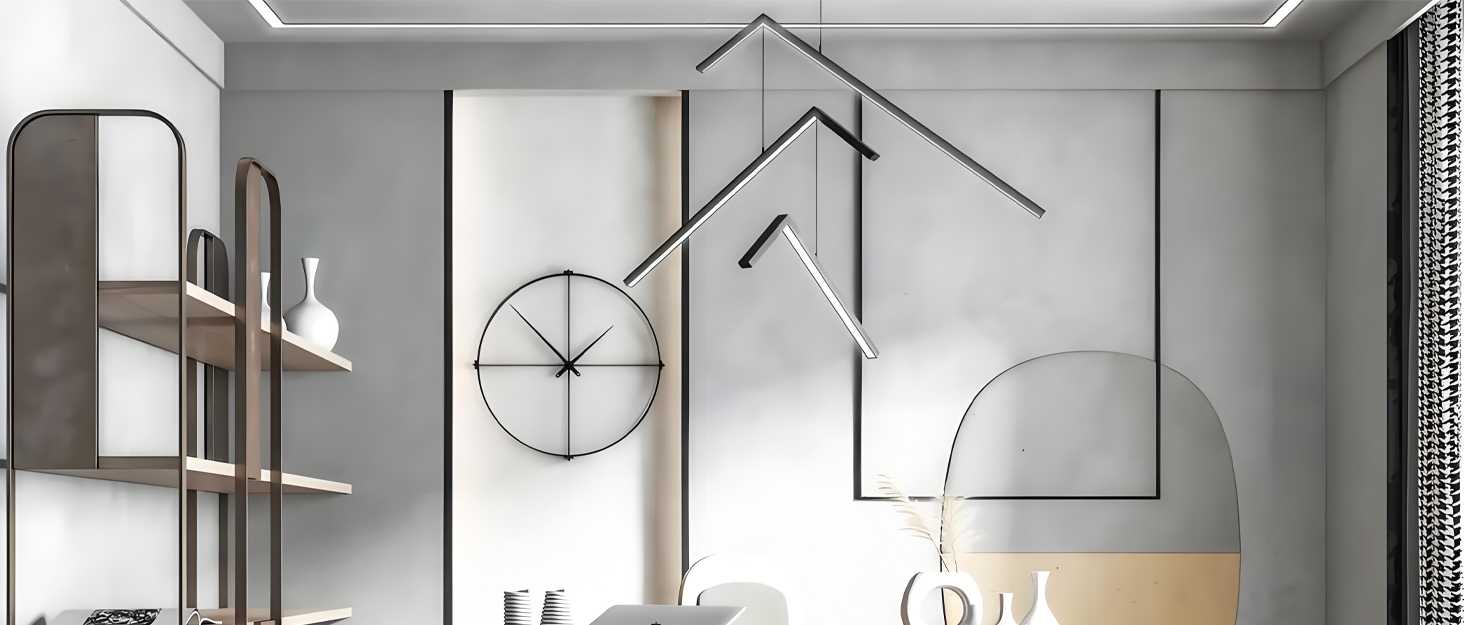 Modern minimalist interior with white walls, featuring a large circular wall clock, geometric shelving unit, and stylish pendant lighting fixtures.