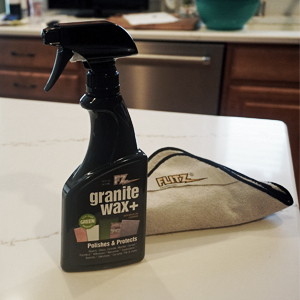 microfiber and spray cleaner on countertop, kitchen cleaning and restoration