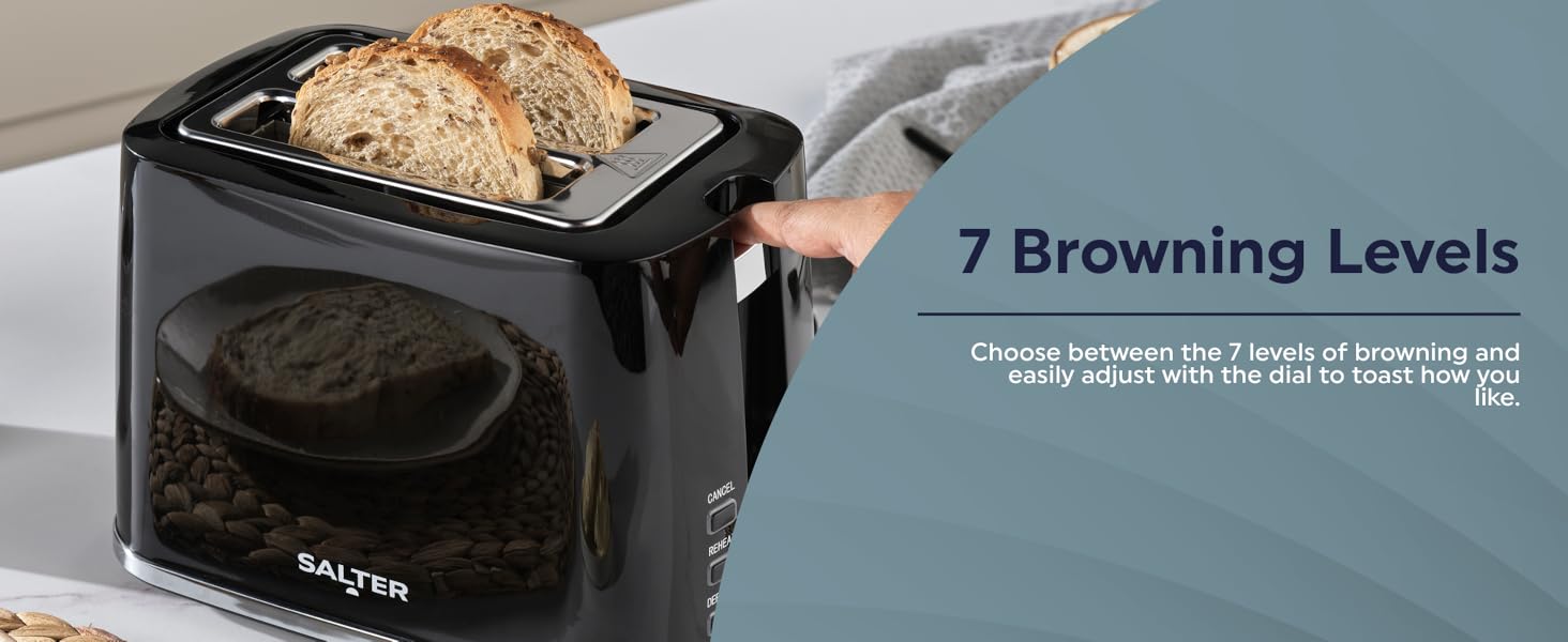 A toaster with bread in it and a person pushing down the lever ready to be toasted.