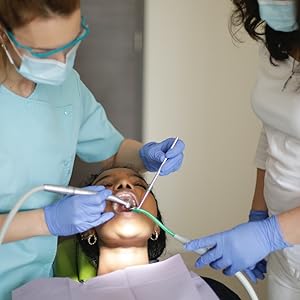 dental procedure with blue nitril glove