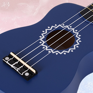 Close-up of a navy blue ukulele's sound hole and strings, featuring decorative pattern around the sound hole.