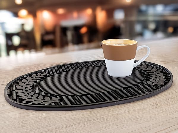 Multi-functional rubber mats for the bar or kitchen that catches spills and protects surfaces.