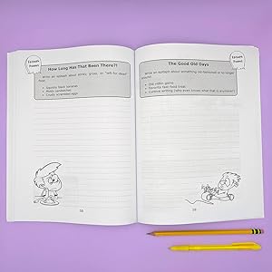 Open book with pencils.