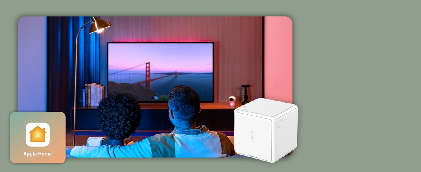two people sitting on a couch watching a tv with the golden gate bridge in the background.