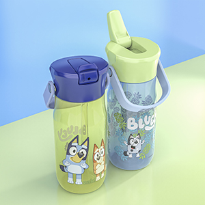 Set of two Bluey plastic kids water bottles on blue and green background