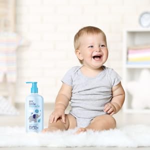 A baby hygiene product dispenser with blue packaging shown in use. Multiple views demonstrate the dispensing mechanism.