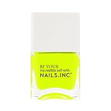 neon yellow nail polish with white cap