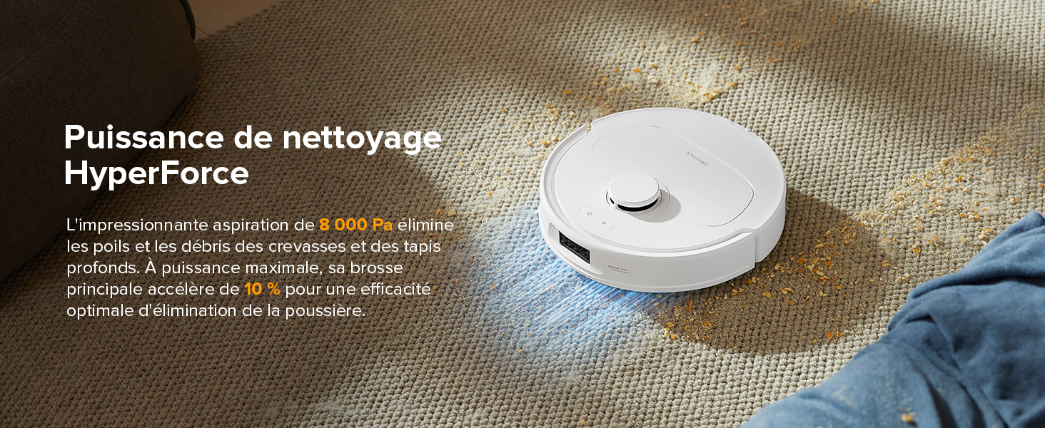 sur tapis beige, démontrant son pouvoir nettoyant en éliminant une grosse tache de saleté. Le texte décrit la technologie de nettoyage « HyperForce ».