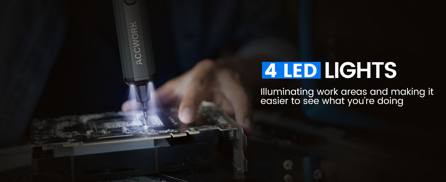 Close-up of a work area illuminated by 4 LED lights, showing detail of tool operation on a surface with visible smoke or debris.