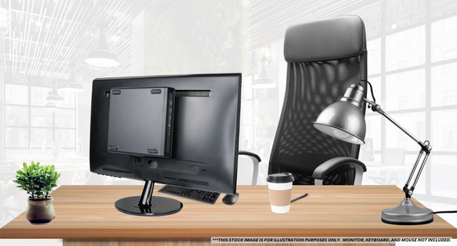 Envision M1 Mini PC mounted on the back of a monitor set in a business office