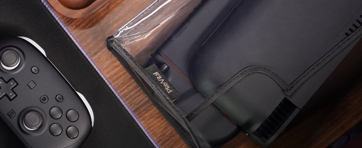 Vue rapprochée des boutons de la manette de jeu et des éléments de l'interface dans des conditions d'éclairage sombre.