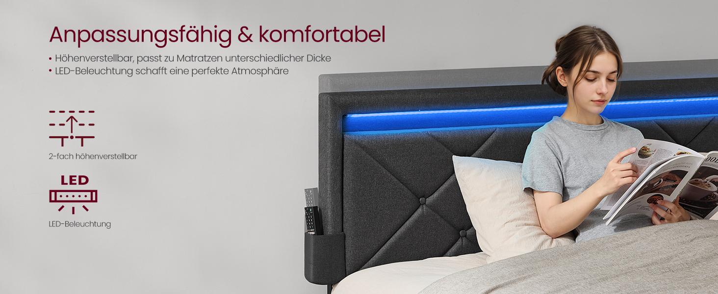 Das verstellbare Bettkopfteil mit dunkelgrauer Polsterung und eingebauter Leselampe wurde bei der Verwendung an der Wand demonstriert