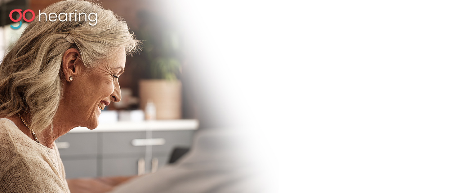 Woman wearing Go hearing aids