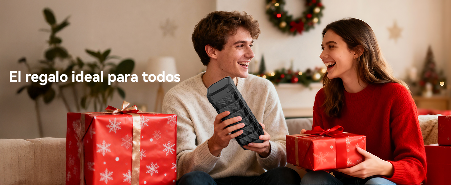 Texto: «El regalo ideal para todos». Escena con cajas de regalo rojas y elementos decorativos con una iluminación cálida.