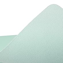 the back of the foam sheet is a light teal color.