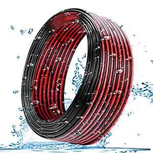 Coiled black and red flexible pipe or tubing surrounded by water splashes, suggesting water-resistant or waterproof properties. The pipe has a ribbed exterior texture.