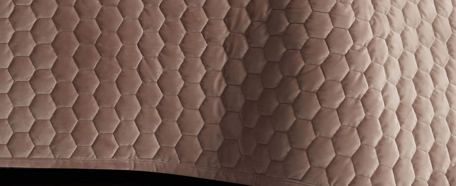 Soft velvet comforter with generous dimensions for a complete, cozy look.
