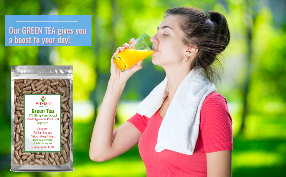 women drinking juice next to green tea capsules