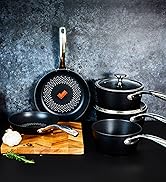 Cooking scenes showing preparation of food items on dark background, including close-up shots of culinary techniques
