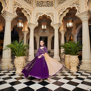 A vibrant and colorful display of traditional Indian fabrics and embroidery, showcasing the intricat