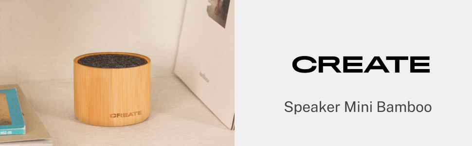 Altavoz cilíndrico pequeño de madera en el suelo. Se ven los textos «CREATE» y «Speaker Mini Bamboo», que indican que se trata de un dispositivo de audio compacto de bambú