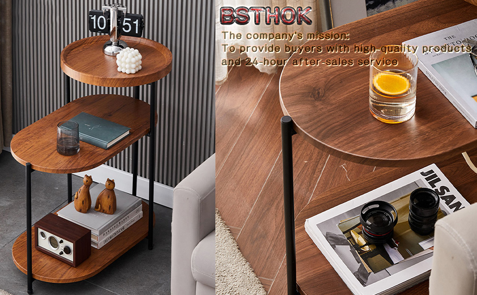 Three-tier wooden display shelf with round platforms, black metal frame, showing various decorative items and beverages placed on its surfaces.