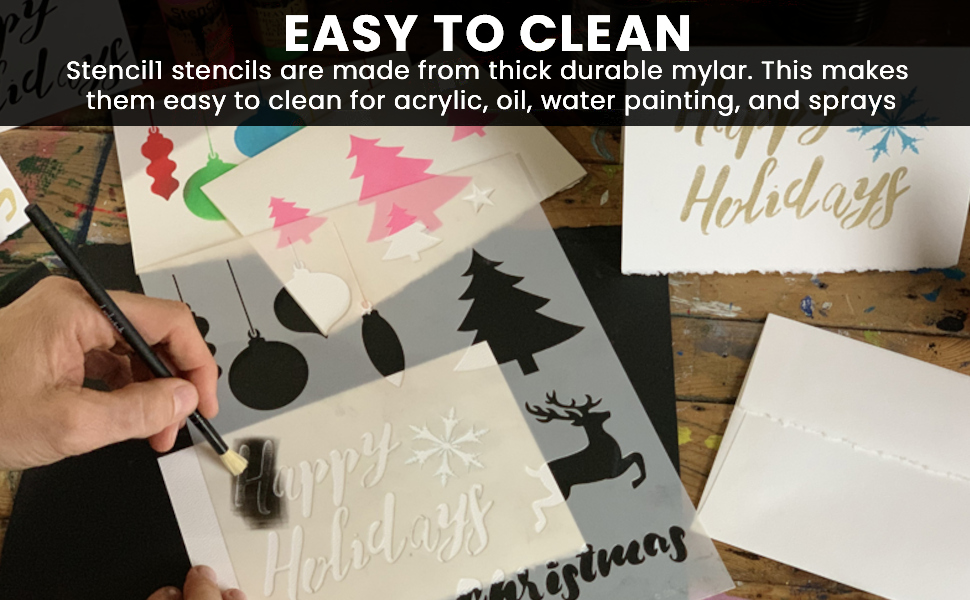 Hands making Holiday Cards with Stencils