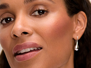 Model wearing Elizabeth Arden Blush