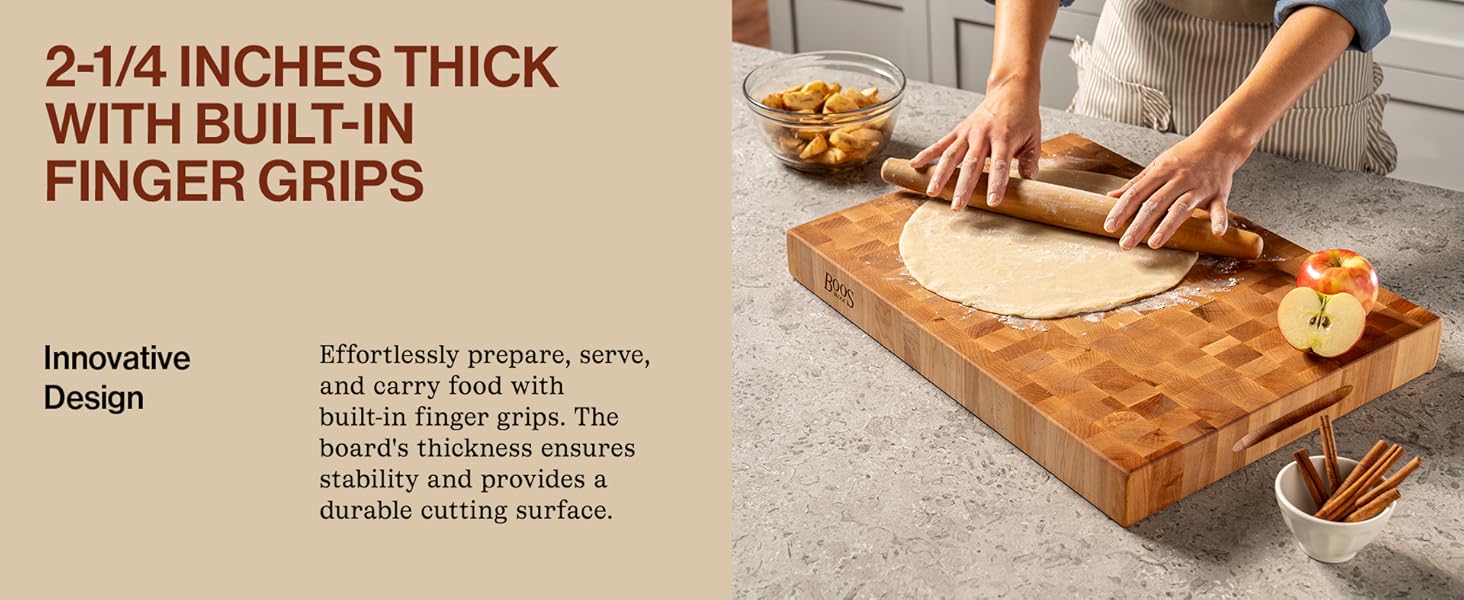 A woman rolling dough on a wooden board. Text reads: 2-1/4 Inch Thick with Built-in Finger Grips.