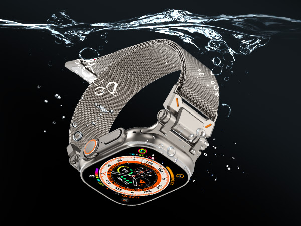 Waterproof smartwatch with metallic mesh band and circular display featuring orange accents, shown submerged with water droplets and splashes.