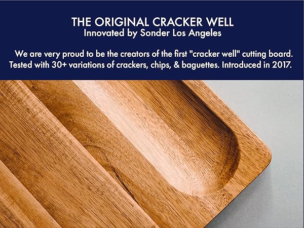 The original cracker well cutting board innovated by Sonder LA.