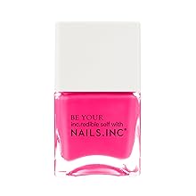 neon pink nail polish with white cap