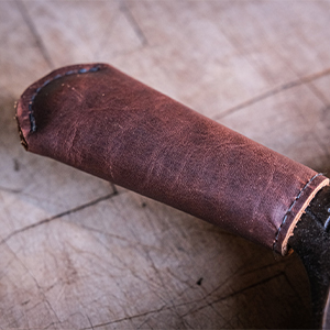 pan handle cover cast iron lodge sleeve leather handmade usa protective cooking cook oven heat grill