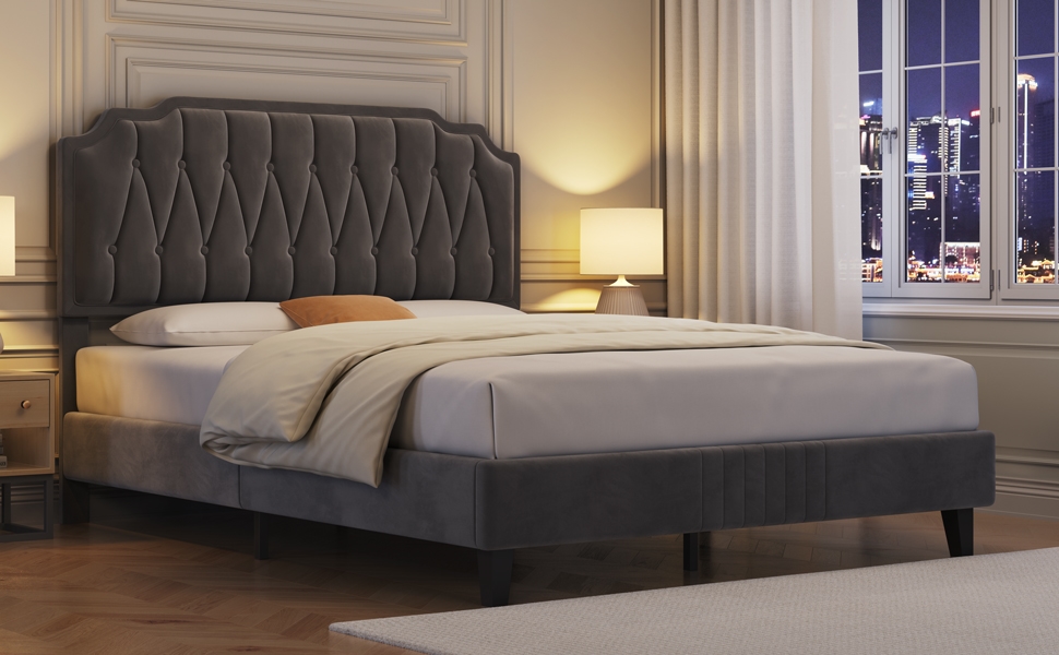 Modern bed frame featuring a dark gray tufted headboard with diamond pattern, shown with white bedding in an elegant room setting with city views.