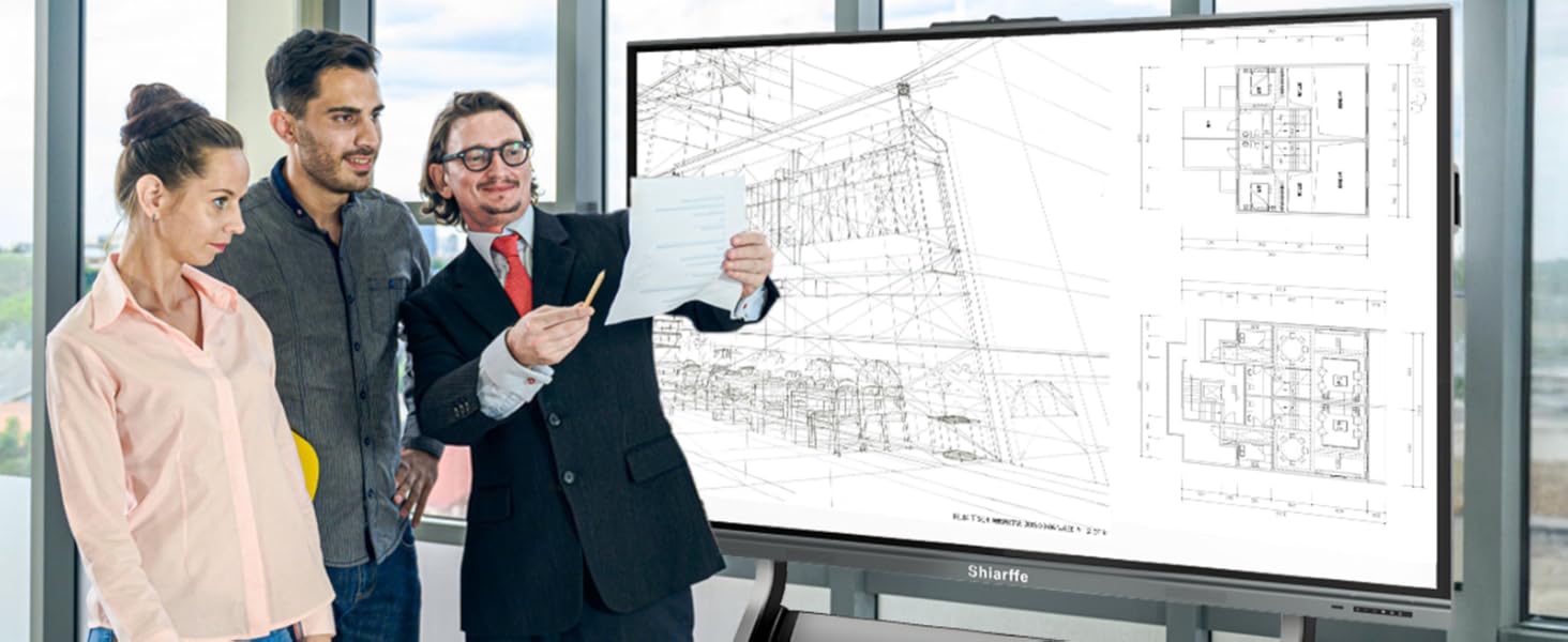 A designer presents their plans to clients on the Smart Board, making adjustments and collaborating