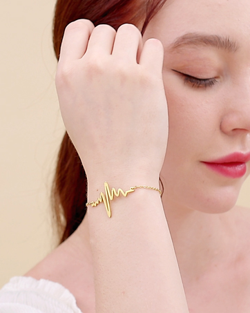 gold heart beat bracelet