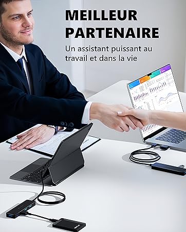 Professional desk setup showing tablet, documents, and connected devices with French text 'Meilleur Partenaire' (Best Partner) promoting work assistance tools.
