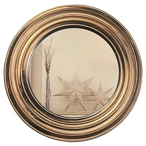round gold mirror